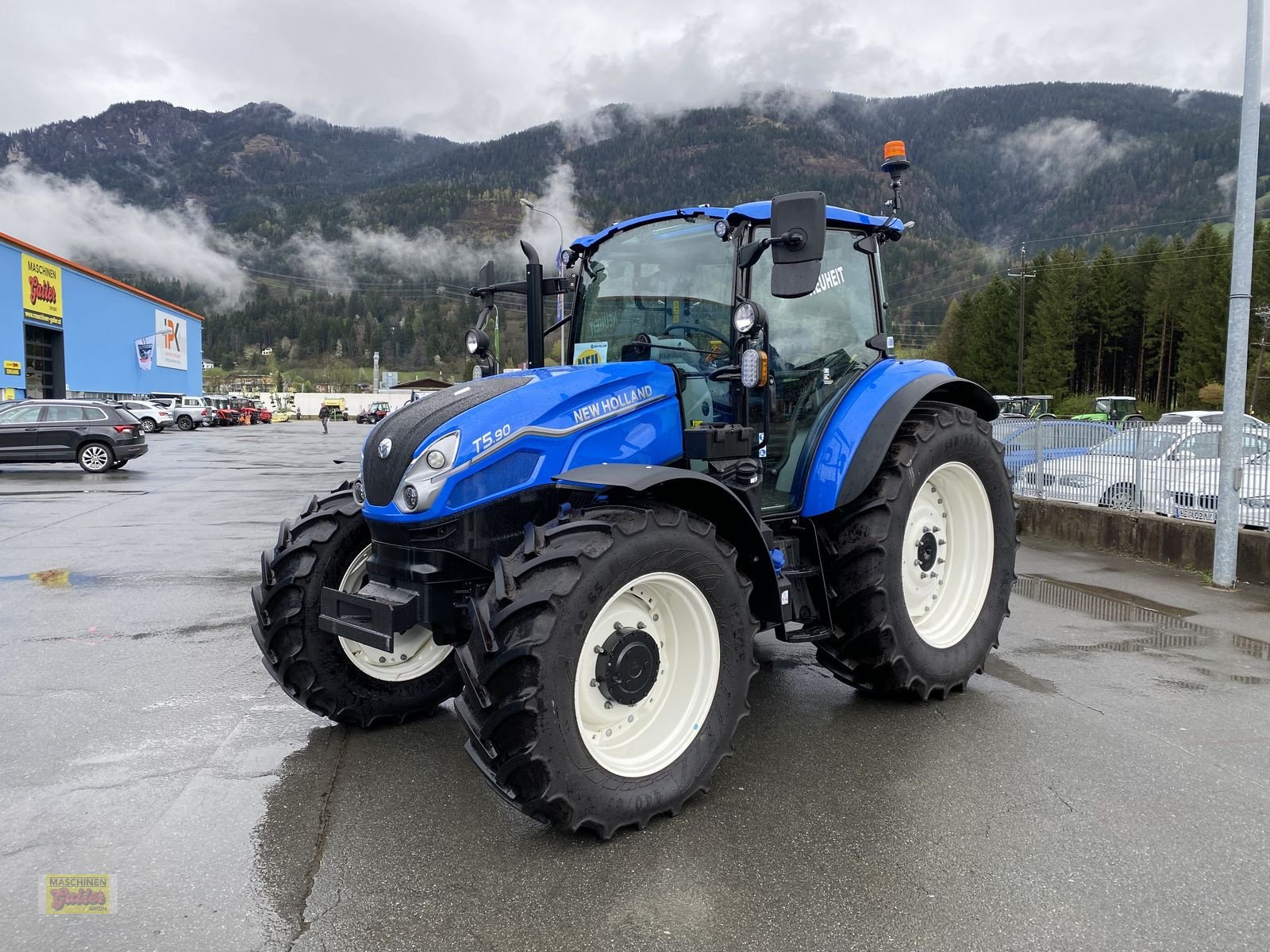 Traktor of the type New Holland T5.90 Dual Command, Neumaschine in Kötschach (Picture 1)
