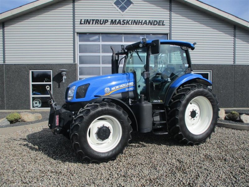 Traktor of the type New Holland T6050 Delte med frontlift, Gebrauchtmaschine in Lintrup