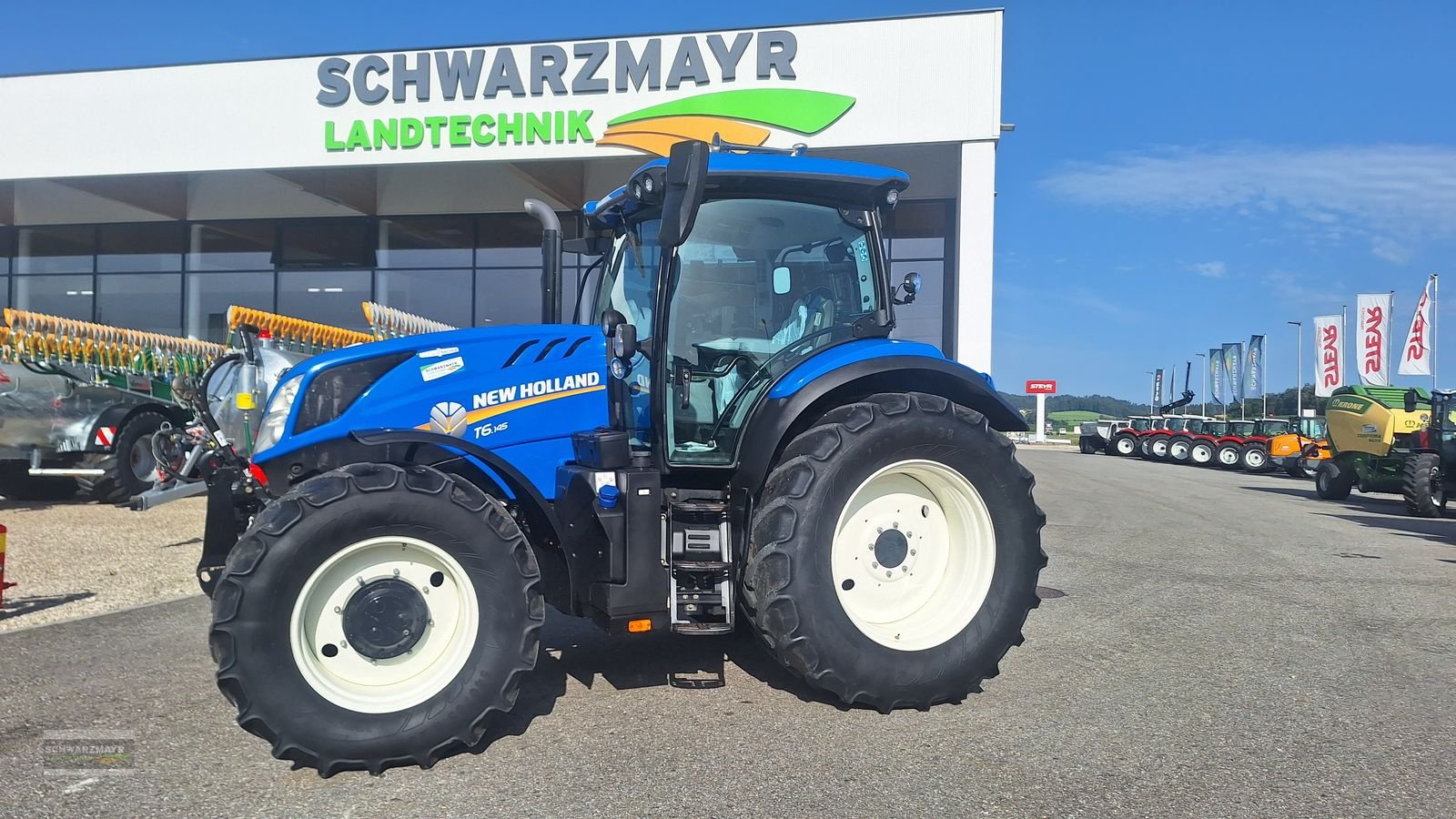 Traktor van het type New Holland T6.145 Auto Command SideWinder II, Gebrauchtmaschine in Gampern (Foto 1)