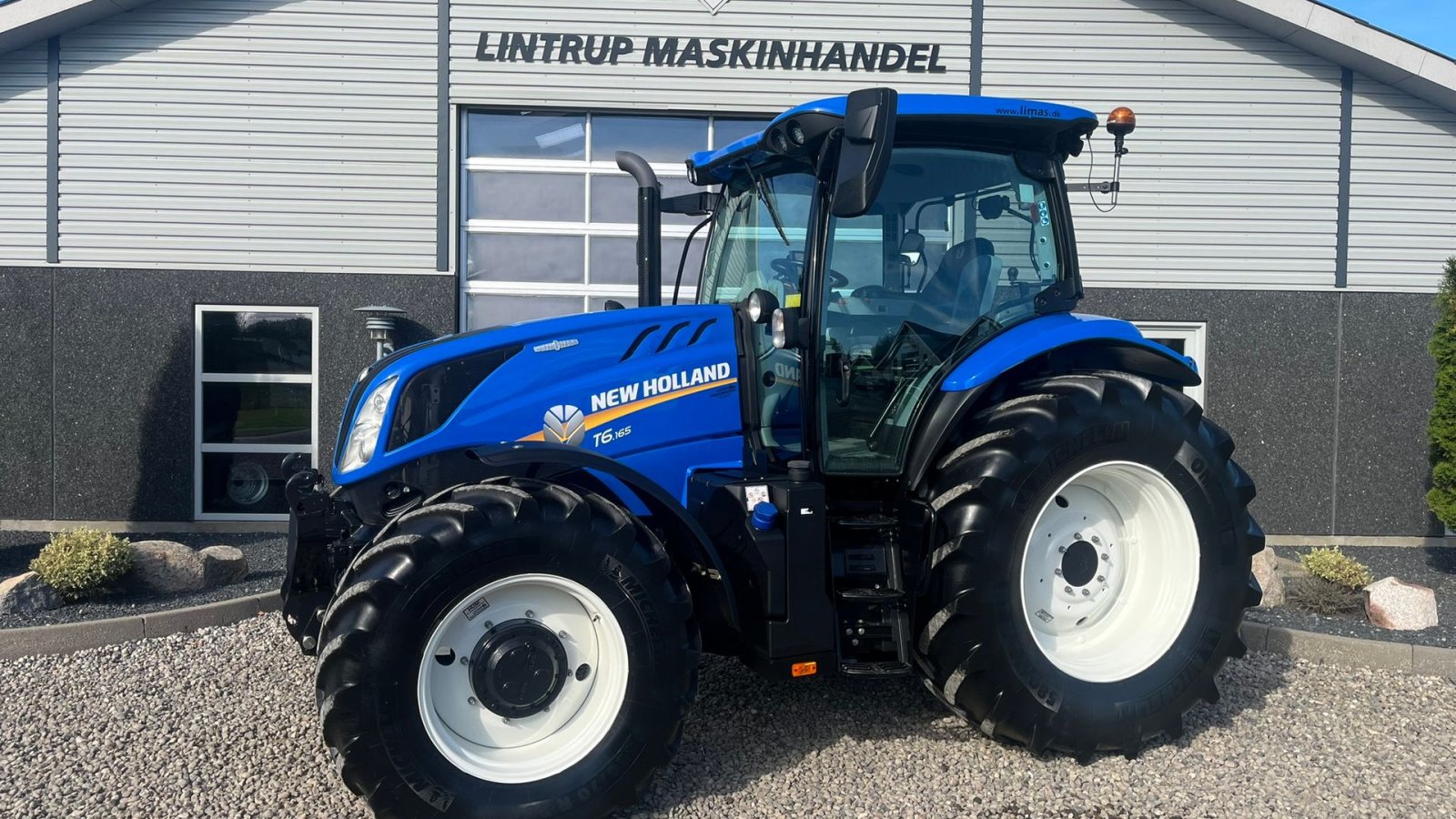 Traktor des Typs New Holland T6.165 AutoCommannd med frontlift, Gebrauchtmaschine in Lintrup (Bild 1)