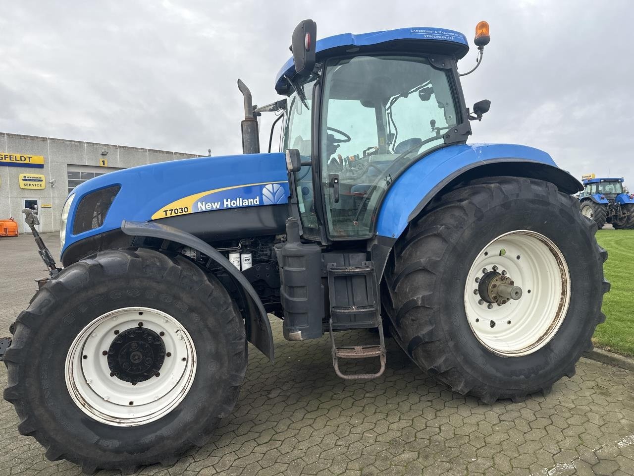 Traktor типа New Holland T7030 TG, Gebrauchtmaschine в Hadsten (Фотография 1)