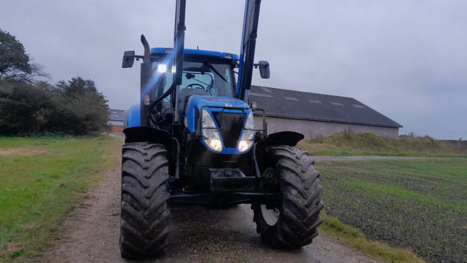 Traktor del tipo New Holland T7060 PC med ÅLØ Q 76 frontlæsser, Gebrauchtmaschine en Skive (Imagen 1)
