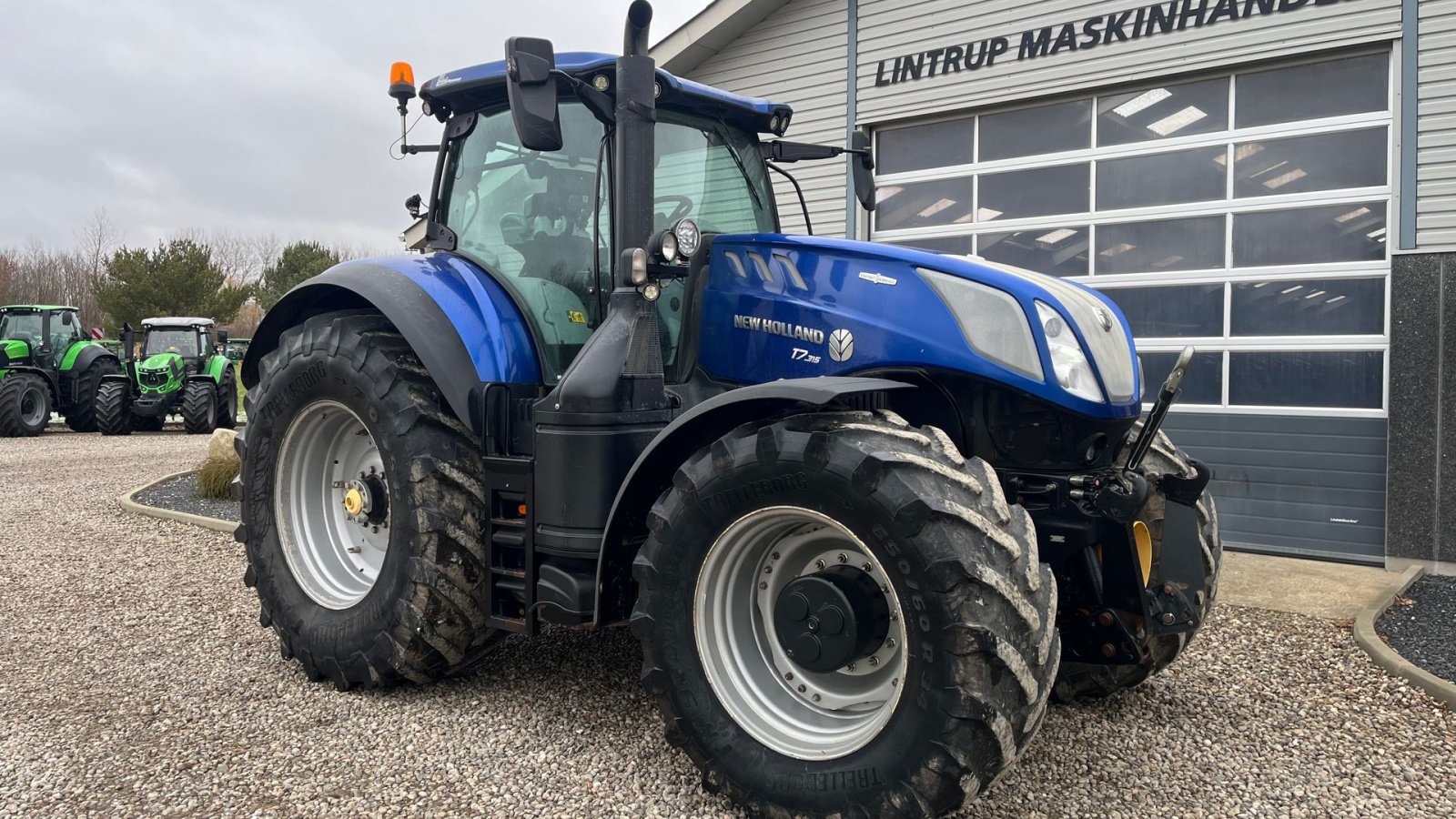 Traktor des Typs New Holland T7.315 BluePower med frontlift og frontpto, Gebrauchtmaschine in Lintrup (Bild 19)