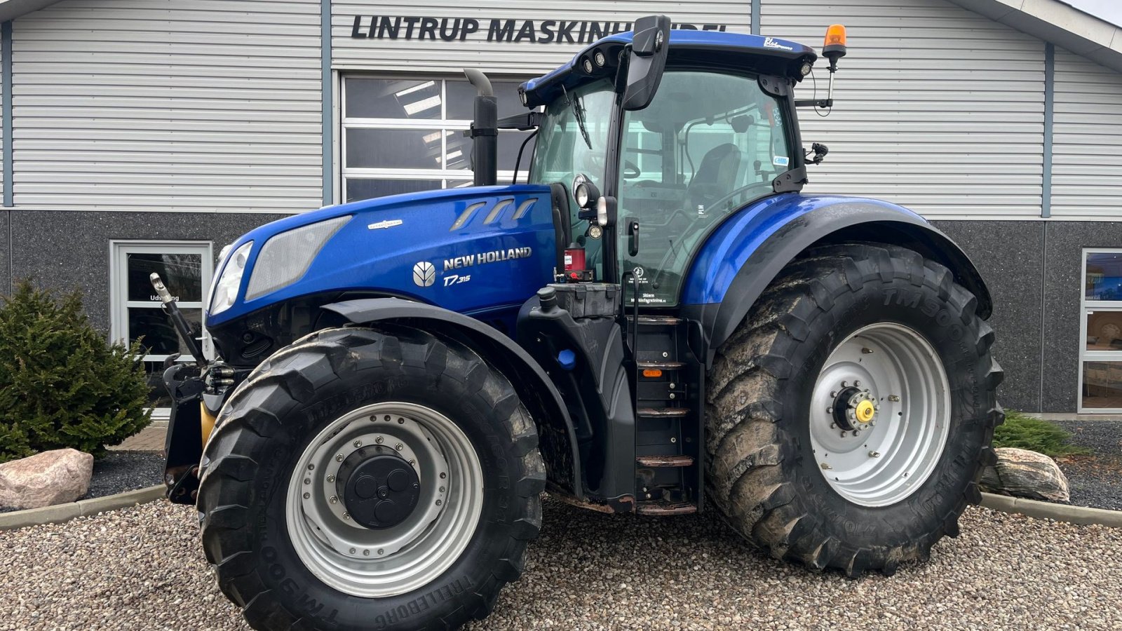 Traktor des Typs New Holland T7.315 BluePower med frontlift og frontpto, Gebrauchtmaschine in Lintrup (Bild 1)