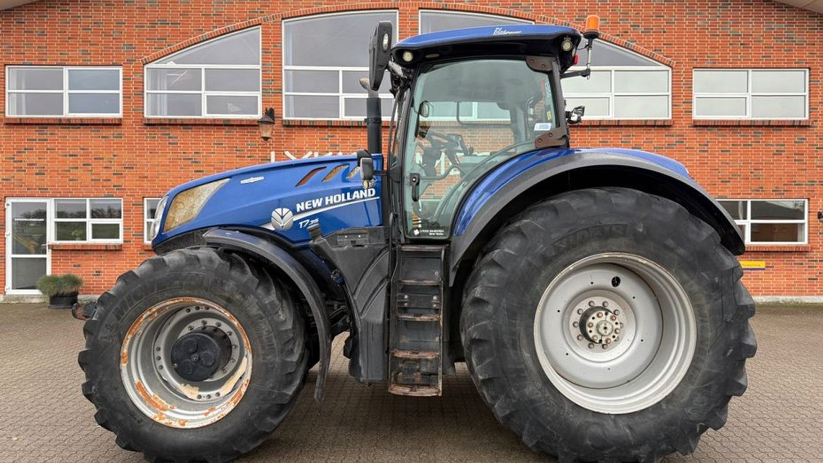 Traktor des Typs New Holland T7.315 HD BluePower, Gebrauchtmaschine in Gjerlev J. (Bild 1)