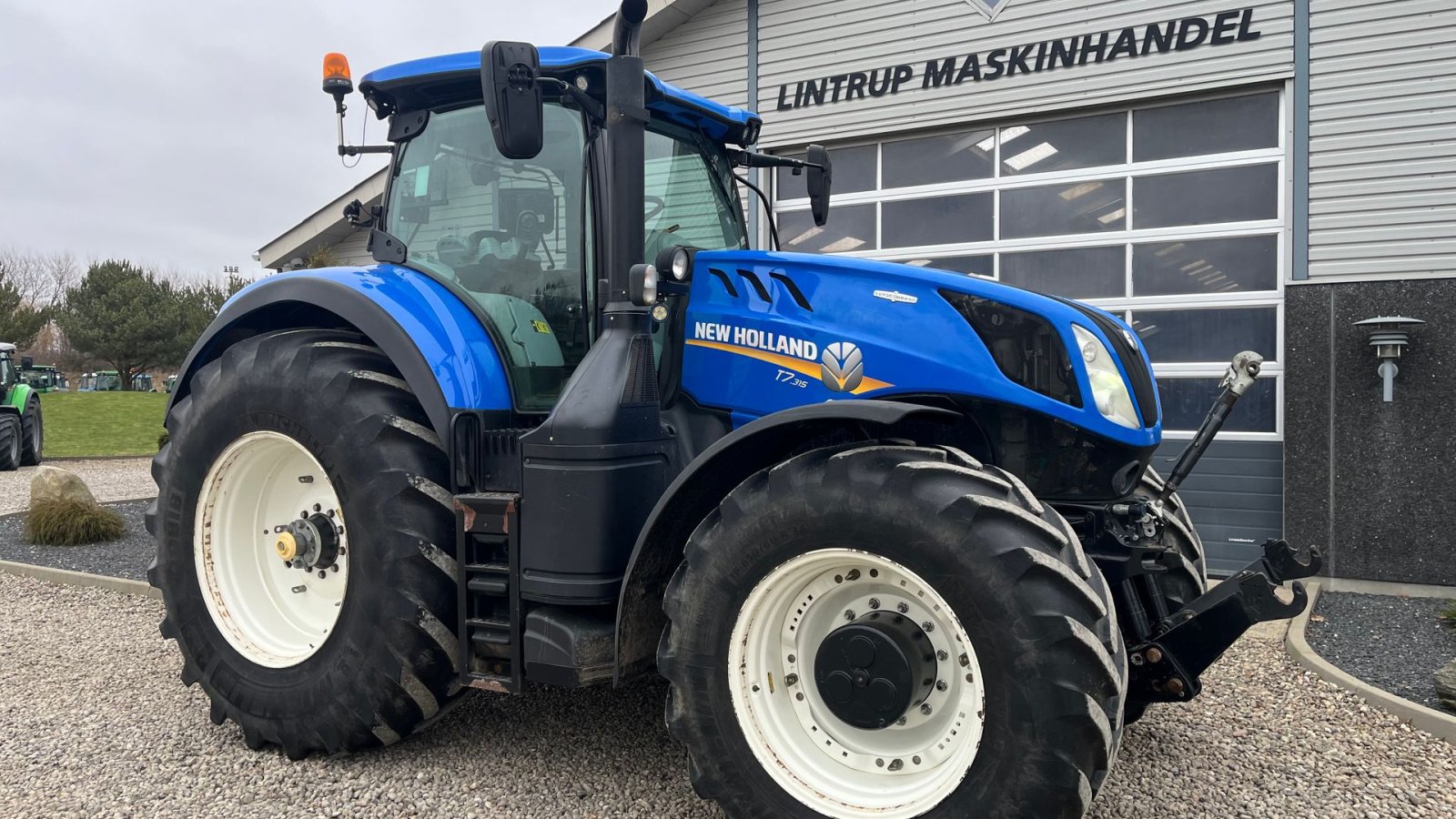 Traktor des Typs New Holland T7.315 Med frontlift, Gebrauchtmaschine in Lintrup (Bild 21)