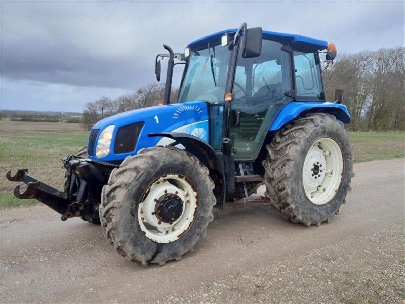 Traktor of the type New Holland TL 90A - 4WD - El-vendegear ved rat Med Air Condition og Zudberg frontlift, Gebrauchtmaschine in Skive (Picture 1)