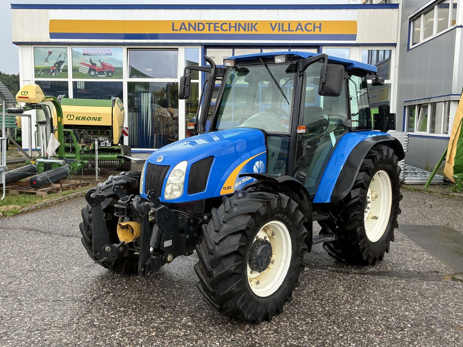 Traktor типа New Holland TL100A (4WD), Gebrauchtmaschine в Villach (Фотография 1)