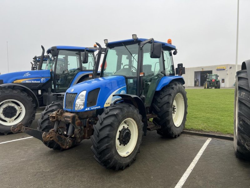 Traktor of the type New Holland TL90A, Gebrauchtmaschine in Hadsten (Picture 1)