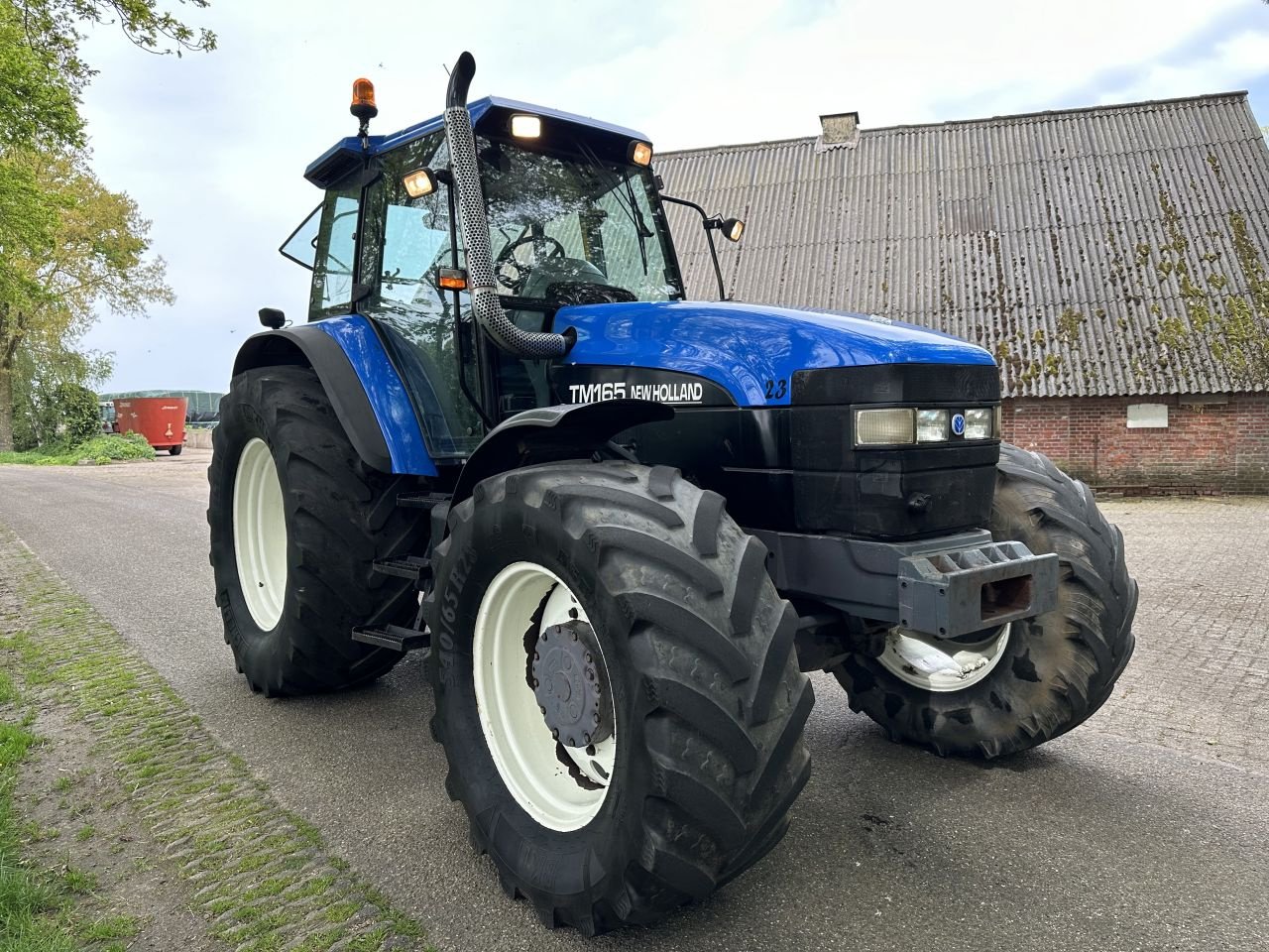 Traktor des Typs New Holland TM 165, Gebrauchtmaschine in Rossum (Bild 2)