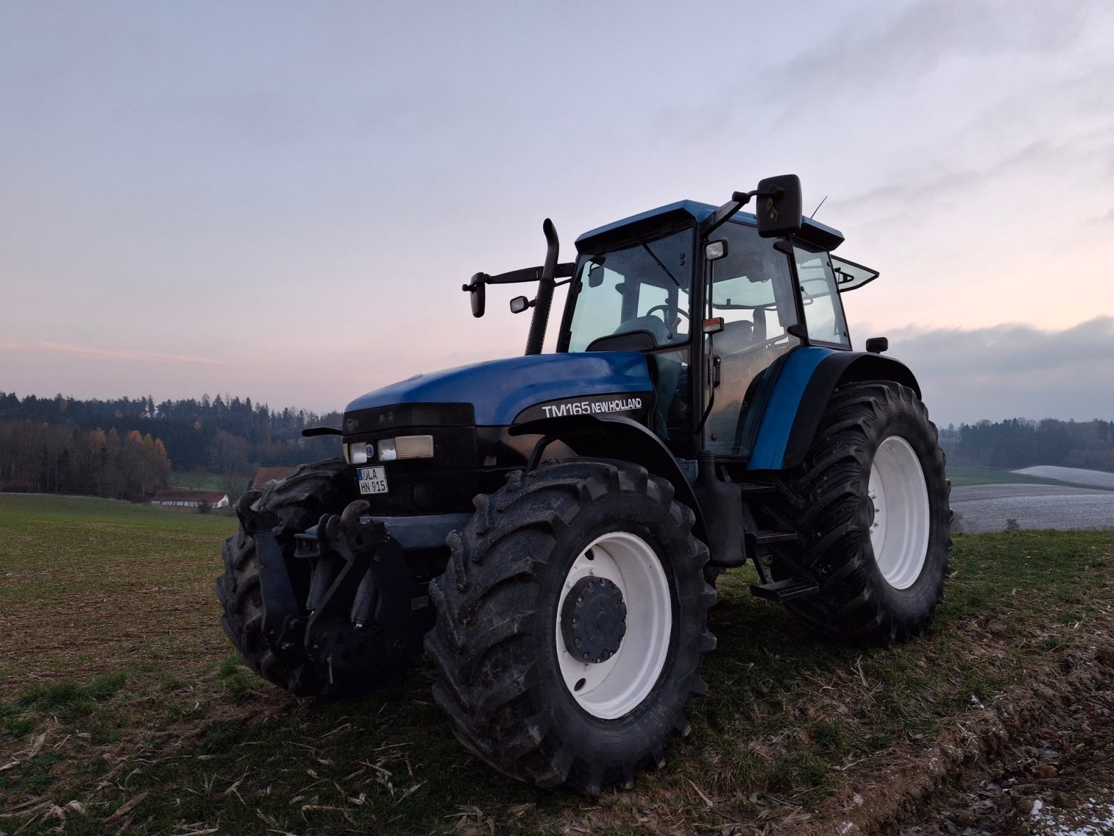 Traktor типа New Holland TM 165, Gebrauchtmaschine в Vilsbiburg (Фотография 1)