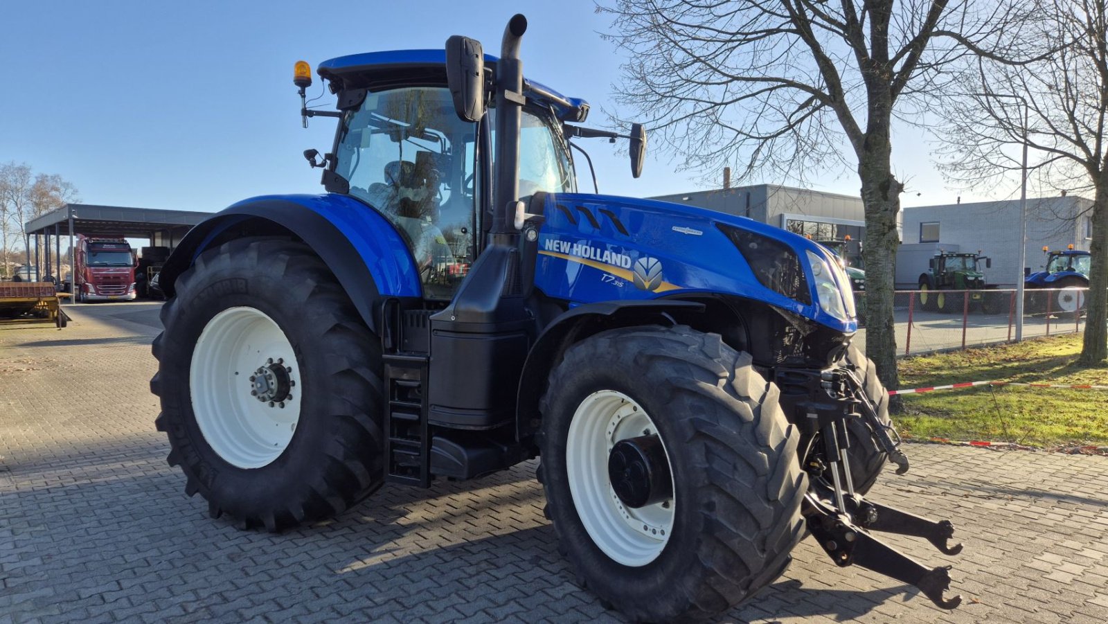 Traktor типа Sonstige NEW HOLLAND T7.315 HD AC 40Kmh Fronthef en Lucht, Gebrauchtmaschine в Schoonebeek (Фотография 1)