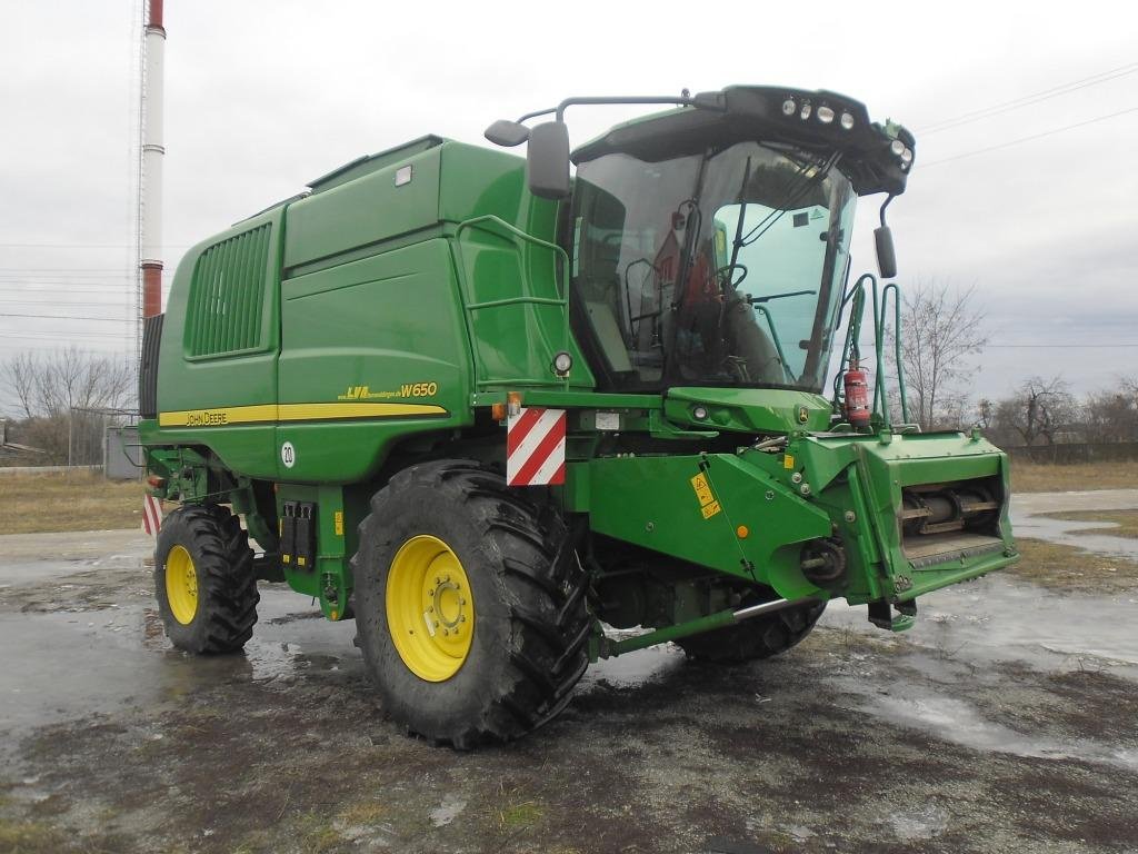 Oldtimer-Mähdrescher a típus John Deere W 650, Neumaschine ekkor: Житомир (Kép 2)