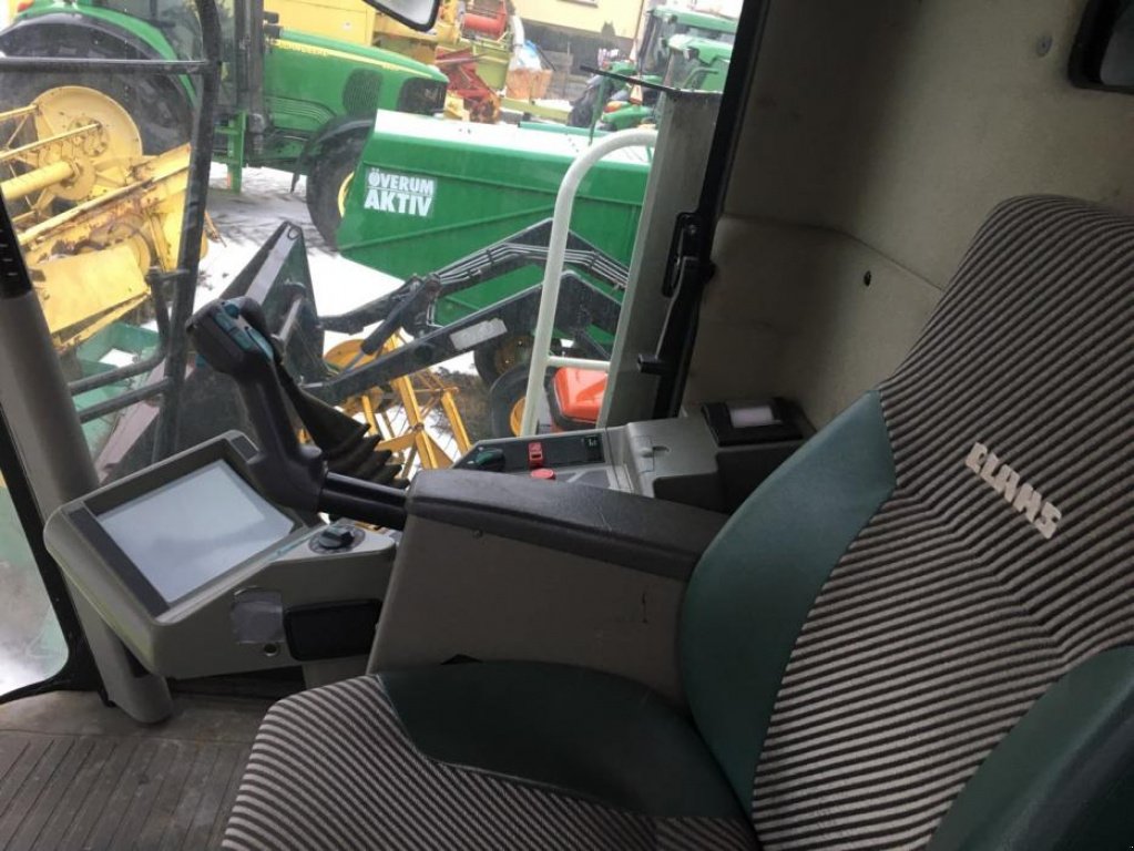 Oldtimer-Mähdrescher des Typs CLAAS Lexion 460, Neumaschine in Луцьк (Bild 5)