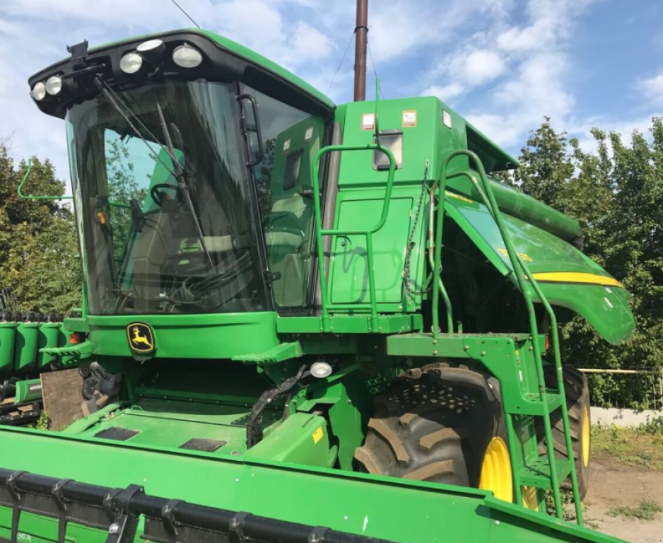 Oldtimer-Mähdrescher des Typs John Deere 9770 STS, Neumaschine in Київ (Bild 10)