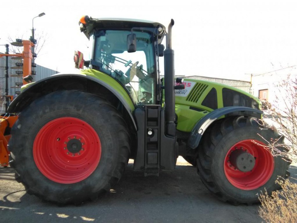Oldtimer-Traktor του τύπου CLAAS Axion 930, Neumaschine σε Хмельницький (Φωτογραφία 2)