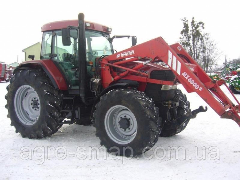 Oldtimer-Traktor del tipo Case IH 135 MX, Neumaschine In Горохів (Immagine 1)