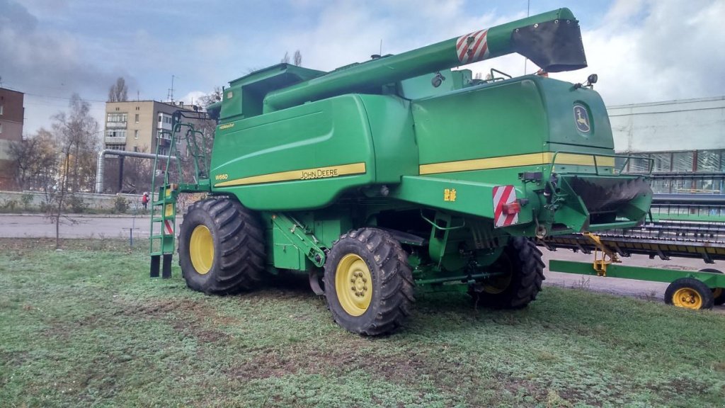 Oldtimer-Mähdrescher des Typs John Deere W660, Neumaschine in Подворки (Bild 2)