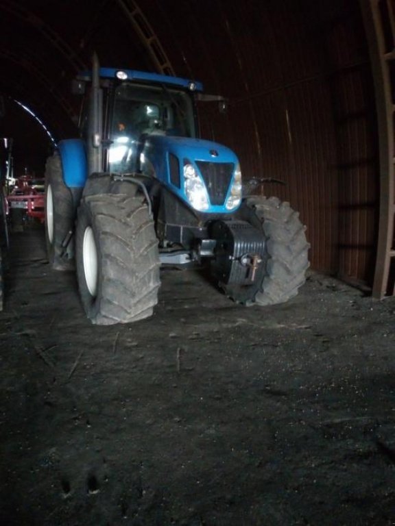 Oldtimer-Traktor del tipo New Holland T7060, Neumaschine In Дніпро (Immagine 1)