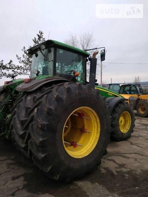Oldtimer-Traktor des Typs John Deere 8530, Neumaschine in Михайлівка (Bild 1)