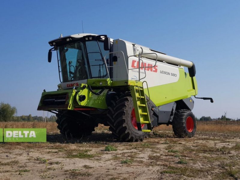 Oldtimer-Mähdrescher of the type CLAAS Lexion 580, Neumaschine in Путрівка (Picture 1)