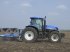 Oldtimer-Traktor typu New Holland T7060, Neumaschine v Хмельницький (Obrázek 1)