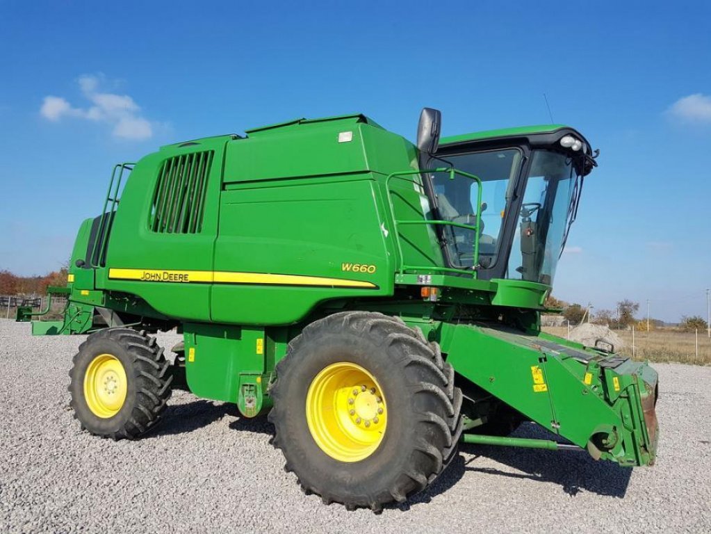 Oldtimer-Mähdrescher des Typs John Deere W660, Neumaschine in Біла Церква (Bild 4)