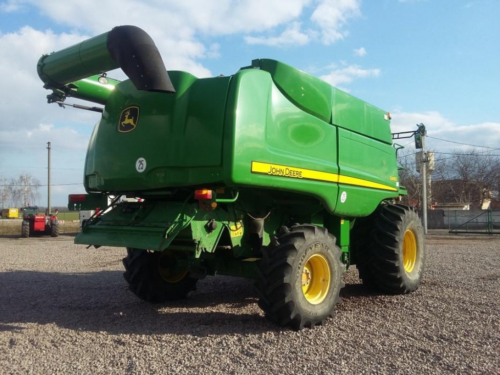 Oldtimer-Mähdrescher des Typs John Deere S690i, Neumaschine in Біла Церква (Bild 5)